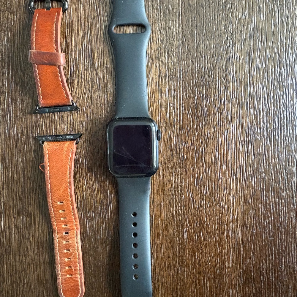 Black Apple Watch SE 40mm Smartwatch with additional Brown Leather Strap